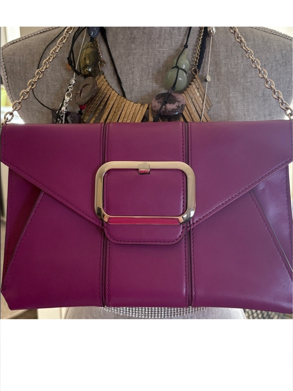 Banana Republic envelope clutch featuring buckle accent and chain strap